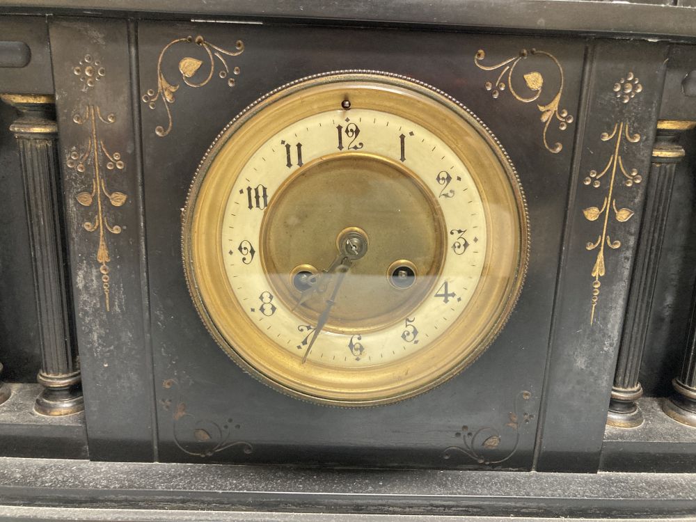 A Victorian black slate mantel clock, 43cm wide, 33cm high